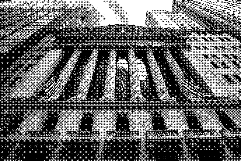 The columns of the New York Stock Exchange on Broad Street, seen from below