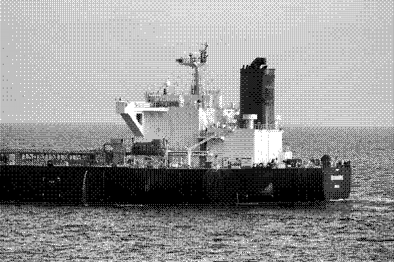 An oil tanker at sea, seen from the side